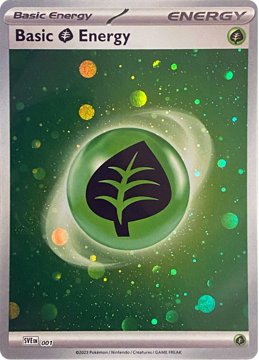 Basic Grass Energy (001) (Cosmos Holo) [Scarlet & Violet: Base Set] - Pokémon - Card Brawlers | Quebec | Canada |
