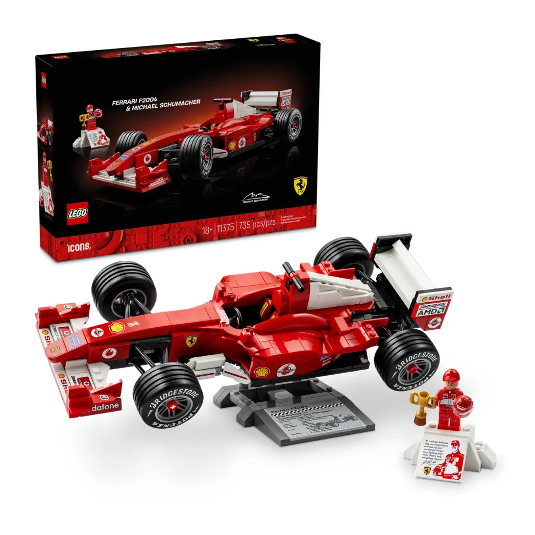 LEGO Ferrari F2004 car on a display stand with Michael Schumacher minifigure and product packaging