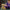LEGO Golden Retriever Puppy figure being adjusted by a woman in a purple shirt to show its poseable features.