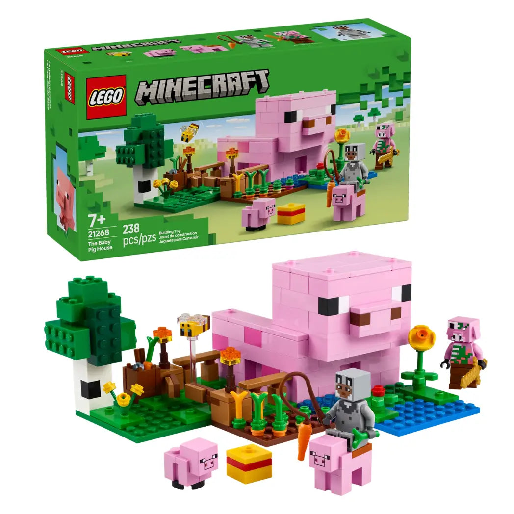 LEGO Minecraft The Baby Pig House set shown assembled in front of its packaging with a pink house, pigs, and figures.