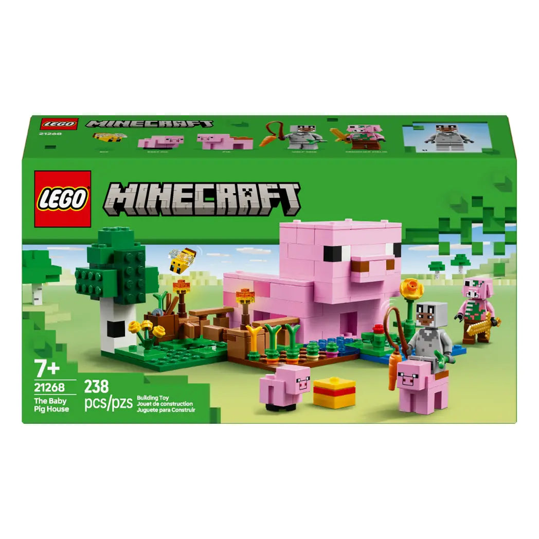 LEGO Minecraft The Baby Pig House box featuring a pink pig-shaped house, small pigs, and Minecraft characters in a grassy landscape.