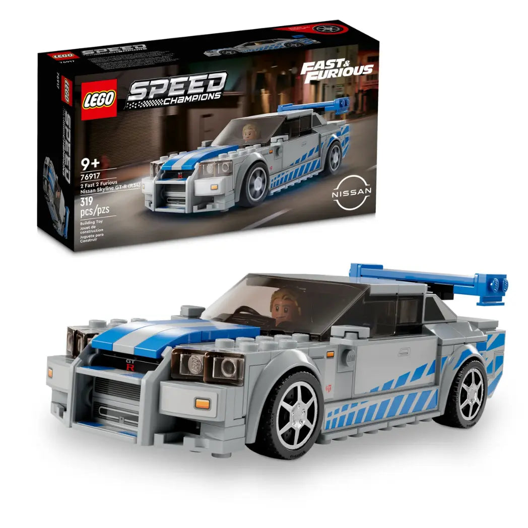 LEGO Speed Champions 2 Fast 2 Furious Nissan Skyline GT-R (R34) set shown assembled with its box, featuring blue racing stripes.