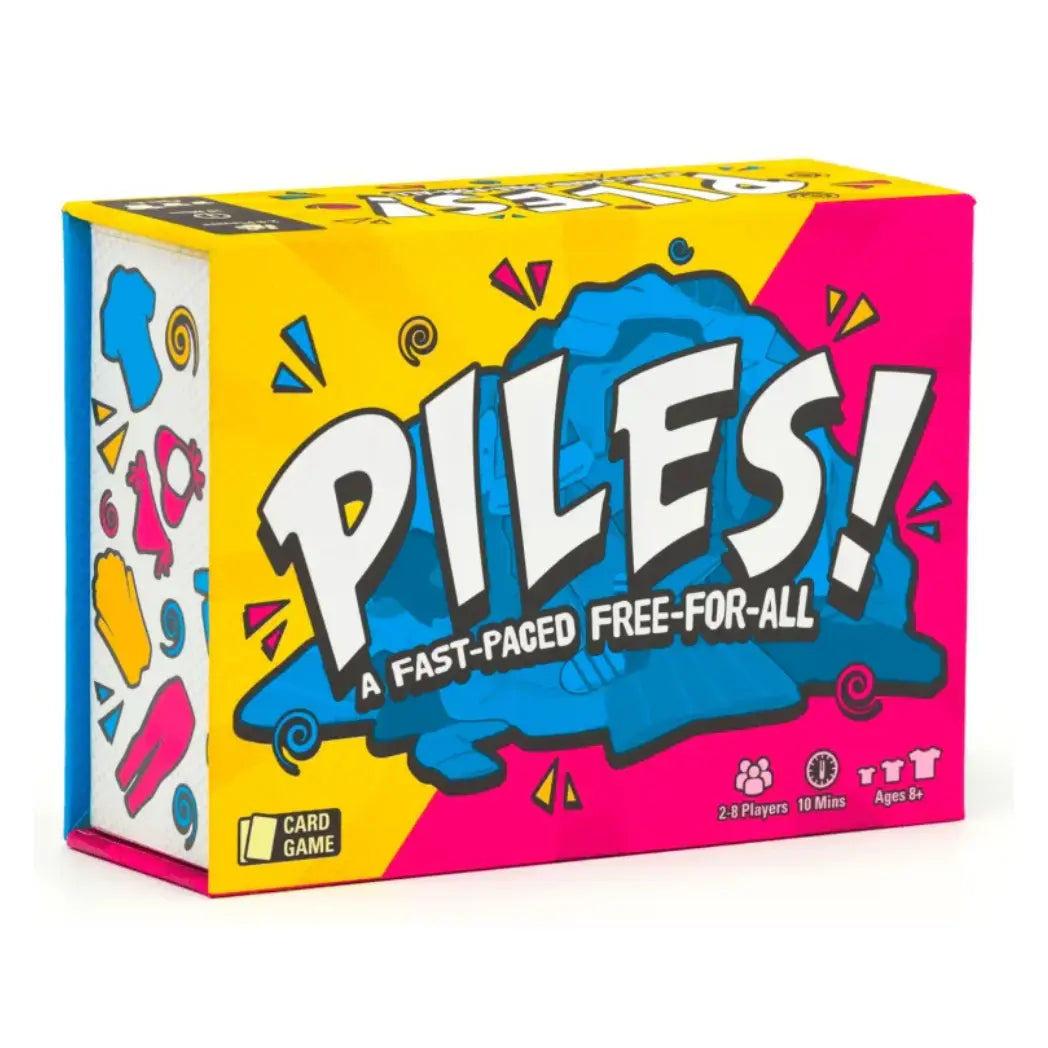 Piles! card game box featuring a large blue pile of clothes on a vibrant yellow and pink background.
