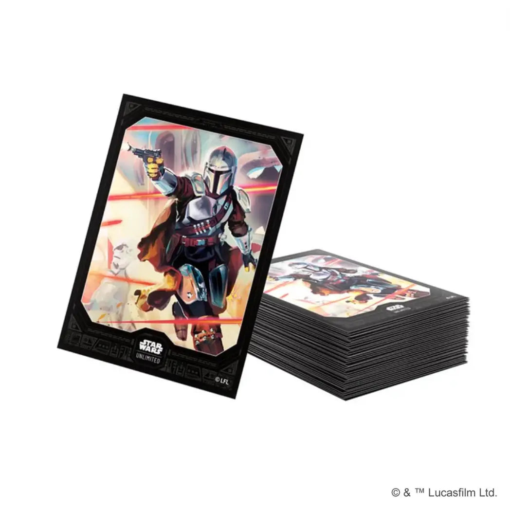 A stack of Star Wars Unlimited art sleeves. Din Djarin is featured on the top sleeve firing a blaster.