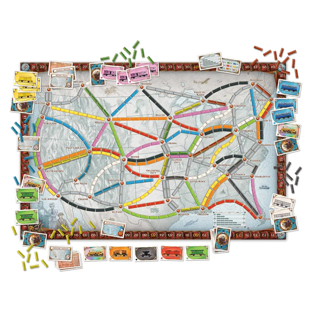 Ticket to Ride board game components including a map of North America, train cards, and plastic train pieces.