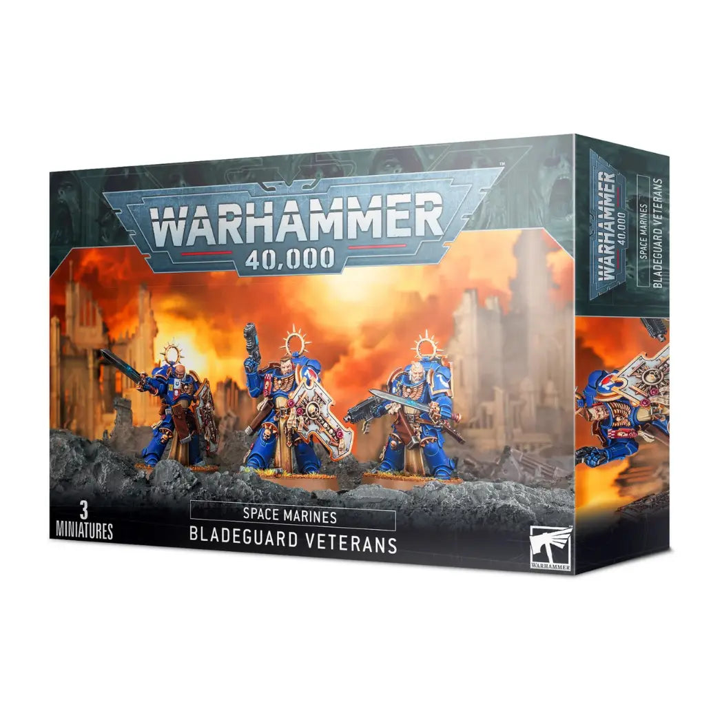Warhammer 40,000Space Marines  Bladeguard Veterans box featuring three blue-armored Space Marines with ornate shields and power swords.