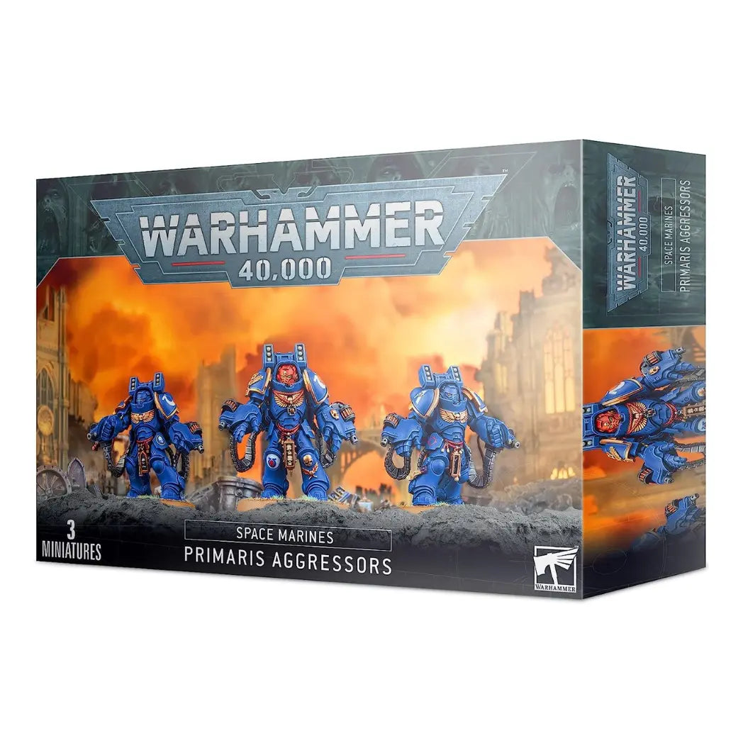 Warhammer 40,000 Space Marines  Primaris Aggressors box featuring three heavy blue-armored Space Marines with flamestorm gauntlets.