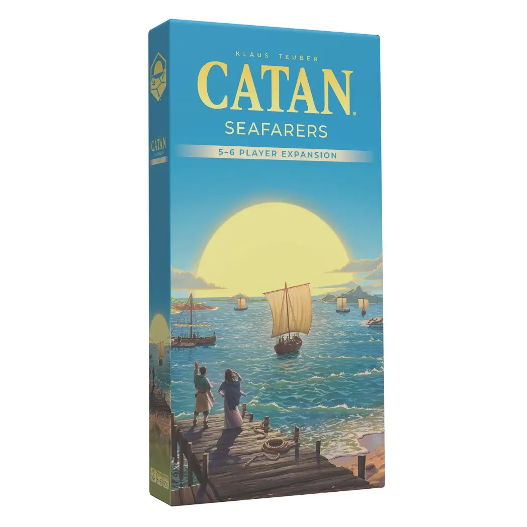 Catan Seafarers 5-6 Player Expansion box featuring a large yellow sun setting over a turquoise sea with sailing ships.